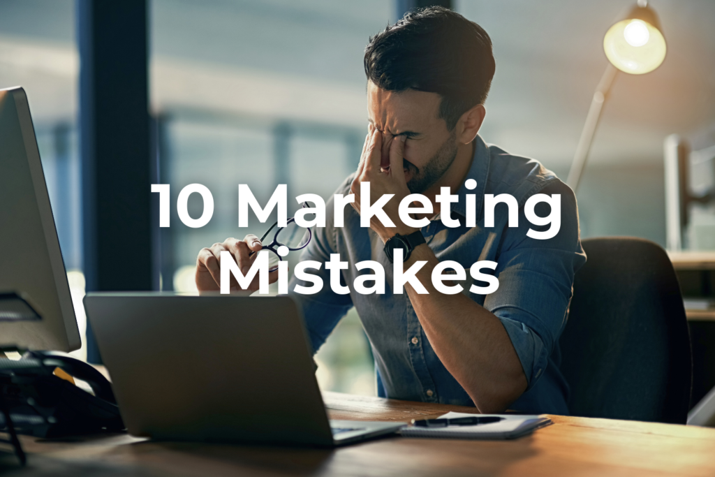 Stressed out marketing employee at a computer