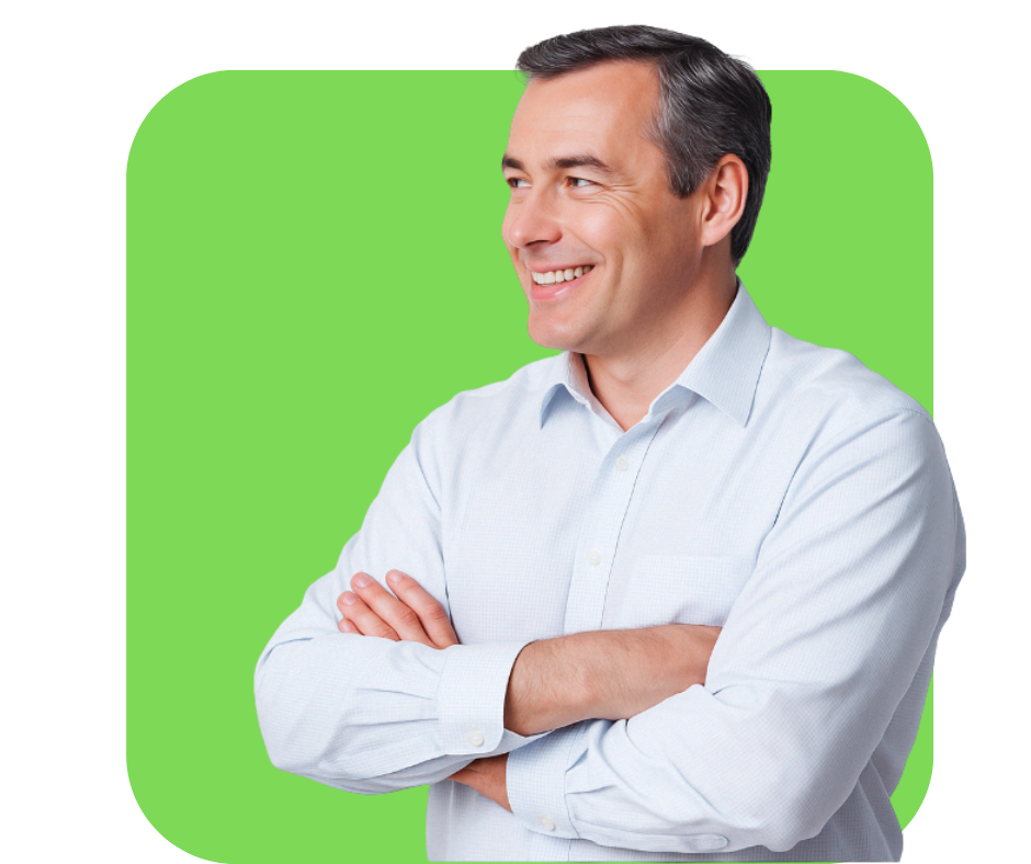 Smiling man in button up shirt with a green background, representing a satisfied small business owner supported by Playbook Digital